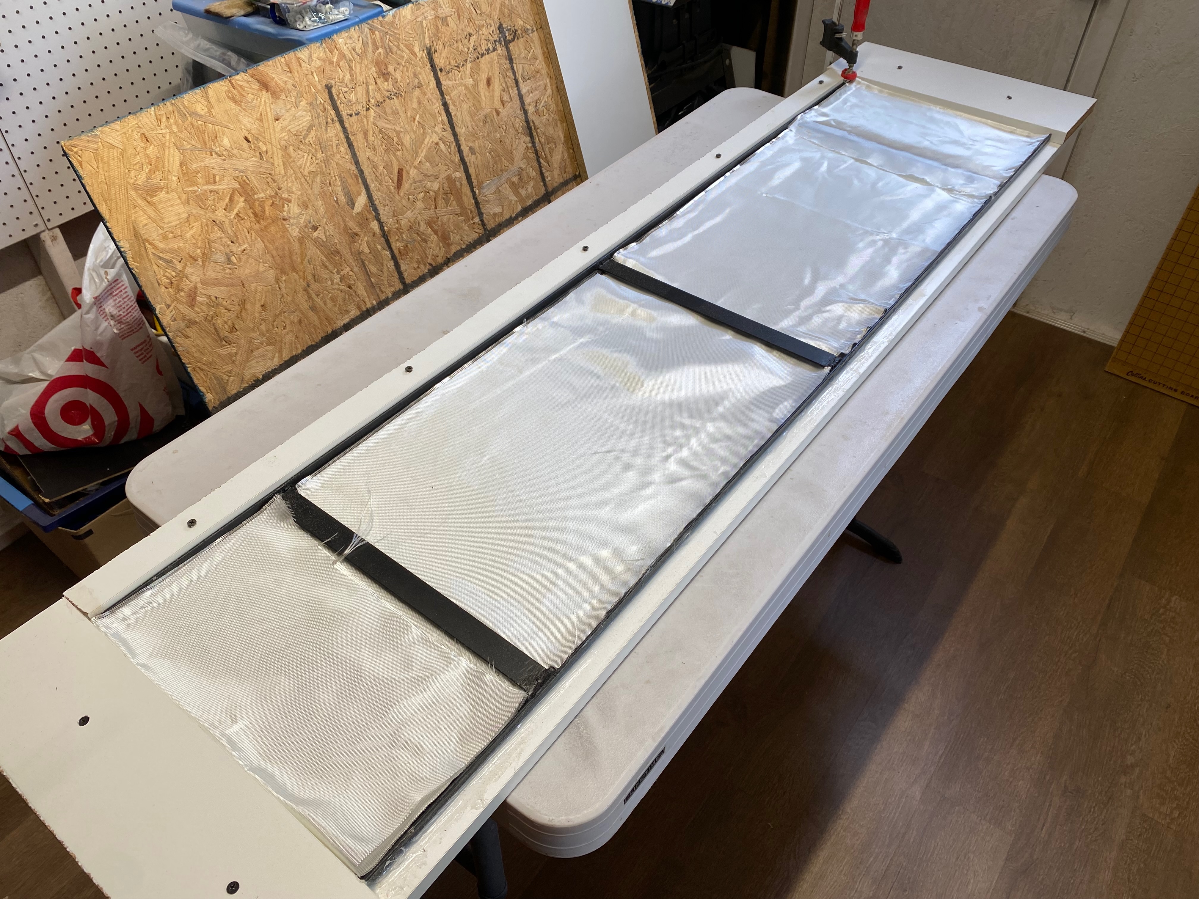 Fiberglass laid into the mould.